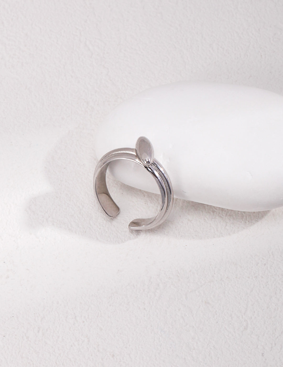 Adjustable Sterling Silver ring crafted from high-quality S925 silver, available in platinum and retro gold finishes. This open ring fits finger sizes 11-15 and has a width of approximately 10mm. Featuring a sleek silhouette and minimalist design, it’s perfect for layering or as a statement piece.