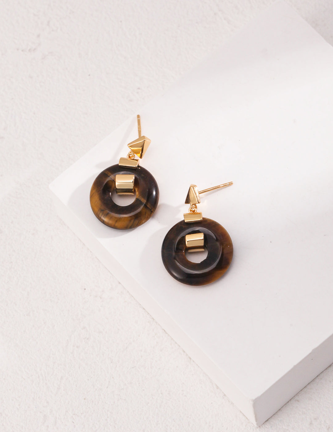 Gold and Stone Sterling Silver Earrings crafted from high-quality 925 silver, featuring speckled stone and tiger eye stone. Available in vintage gold and white gold finishes, these earrings measure approximately 2.8cm in height, perfect for adding unique elegance to any outfit for everyday wear or special occasions.