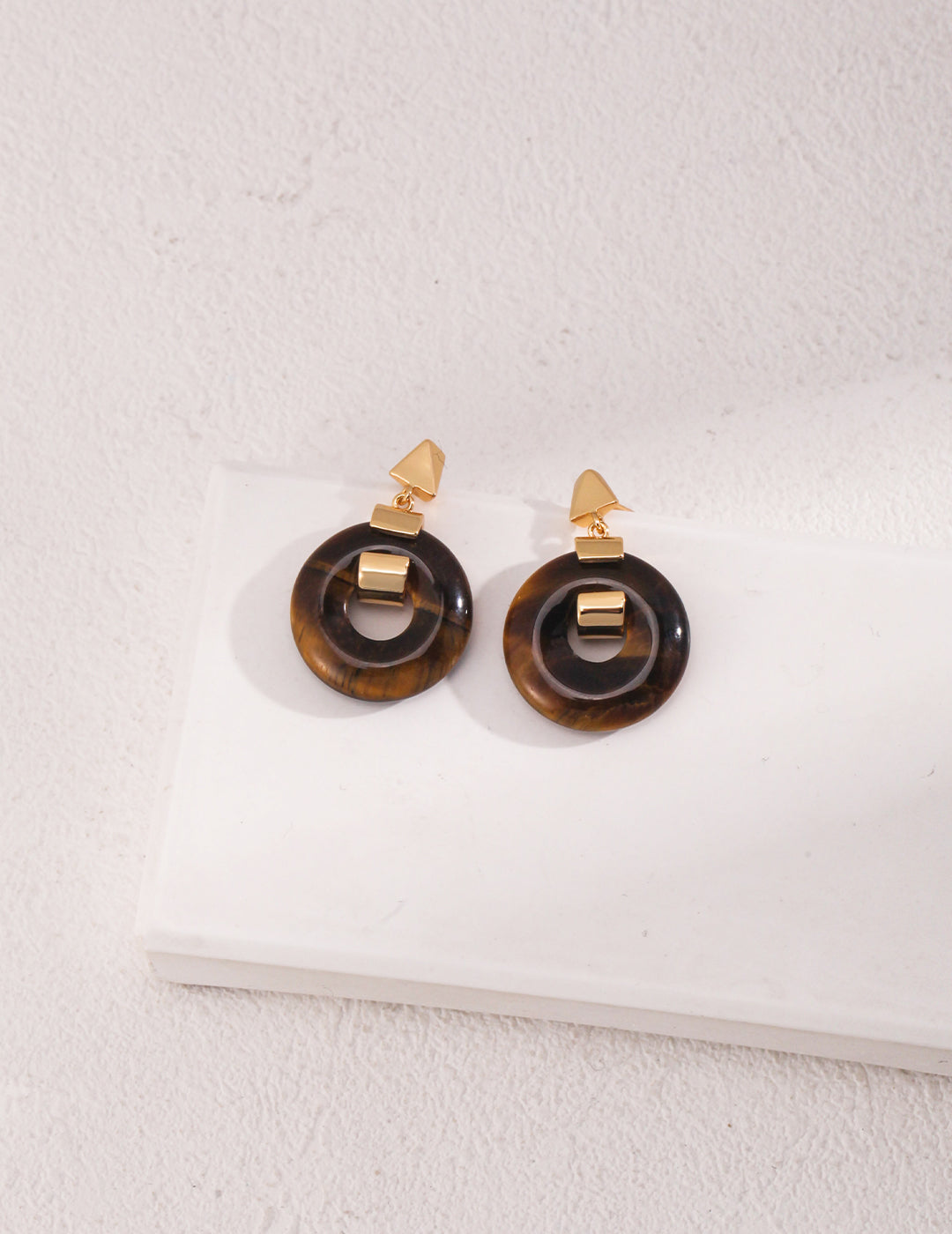 Gold and Stone Sterling Silver Earrings crafted from high-quality 925 silver, featuring speckled stone and tiger eye stone. Available in vintage gold and white gold finishes, these earrings measure approximately 2.8cm in height, perfect for adding unique elegance to any outfit for everyday wear or special occasions.