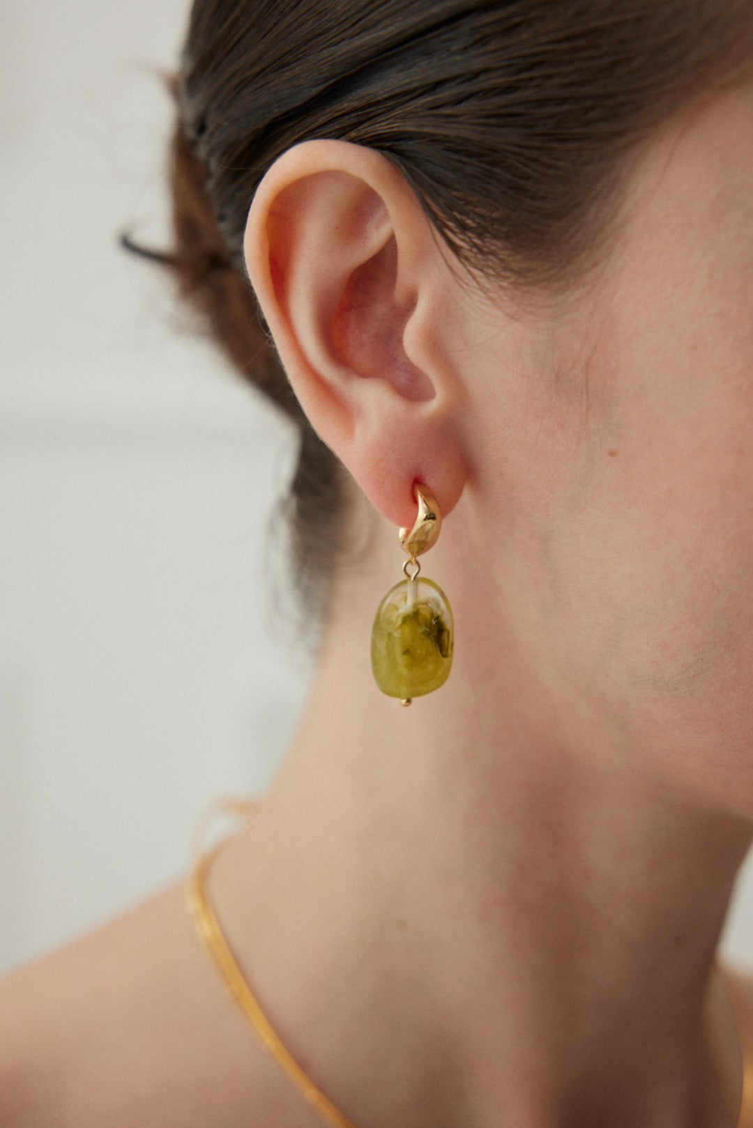 Stylish Modern Green Resin Sterling Silver Earrings crafted from high-quality 925 silver with a vintage gold finish. Each earring measures approximately 3.8cm in height and features vibrant green resin that embodies the essence of nature. A perfect blend of contemporary fashion and natural beauty, ideal for adding a unique touch to any outfit.