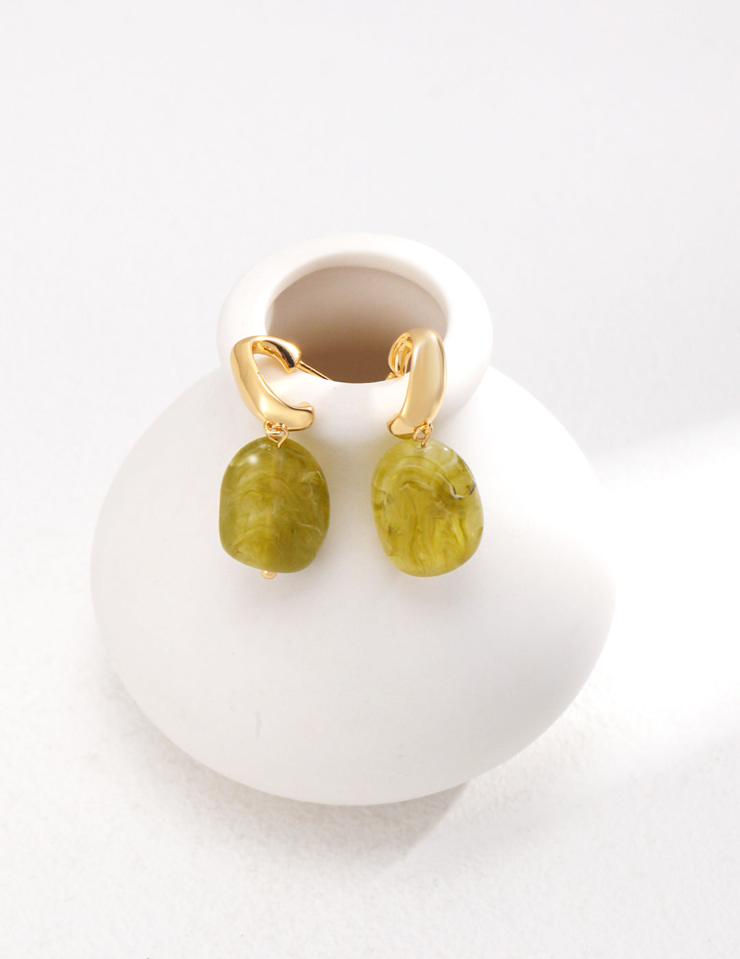 Stylish Modern Green Resin Sterling Silver Earrings crafted from high-quality 925 silver with a vintage gold finish. Each earring measures approximately 3.8cm in height and features vibrant green resin that embodies the essence of nature. A perfect blend of contemporary fashion and natural beauty, ideal for adding a unique touch to any outfit.