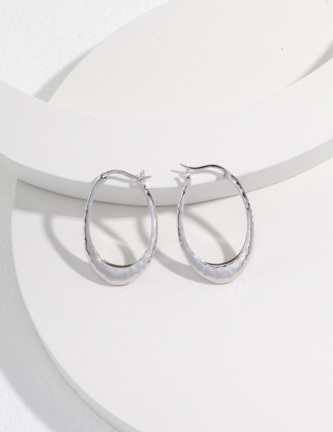 Sterling silver circle unique earrings in S925 silver, available in white gold and retro gold finishes, 33mm in height and 22mm in width, featuring minimalist French style for a chic, understated elegance.