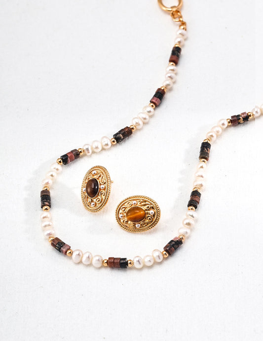 925 sterling silver necklace with natural pearls and tiger eye stones, finished in vintage gold. Features adjustable 40cm length, with 5mm pearls and 4.2mm tiger eye stones, blending sophistication and grounding energy.