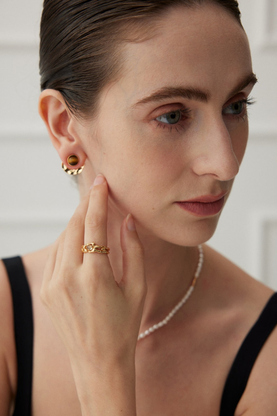 Versatile Sterling Silver Tiger Eye Stone Earrings in vintage gold with 7.5mm tiger eye stones, designed for multiple ways to wear, blending minimalist elegance with chic French style.